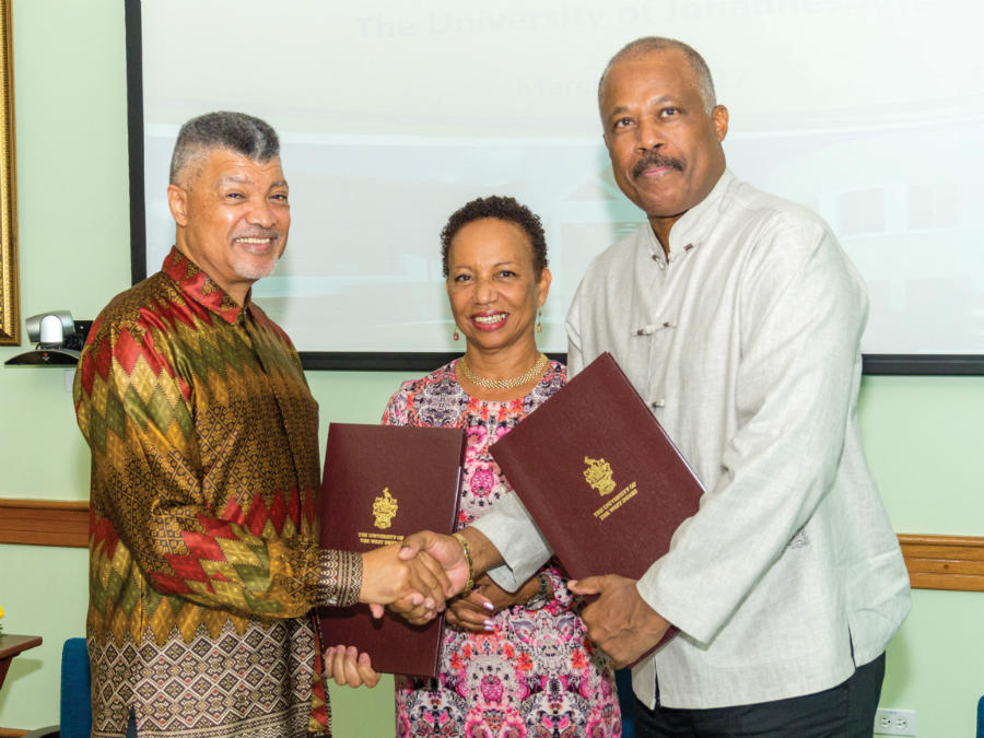 From left to right: Vice-Chancellor and Principal of the University of Johannesburg, Professor Ihron Rensburg, Pro Vice-Chancellor and Principal of The UWI, Cave Hill Campus, Professor V. Eudine Barriteau, and Vice-Chancellor of The UWI, Professor Sir Hilary Beckles at the signing of the Memorandum of Agreement for the establishment of the Institute for Global Africa Affairs.