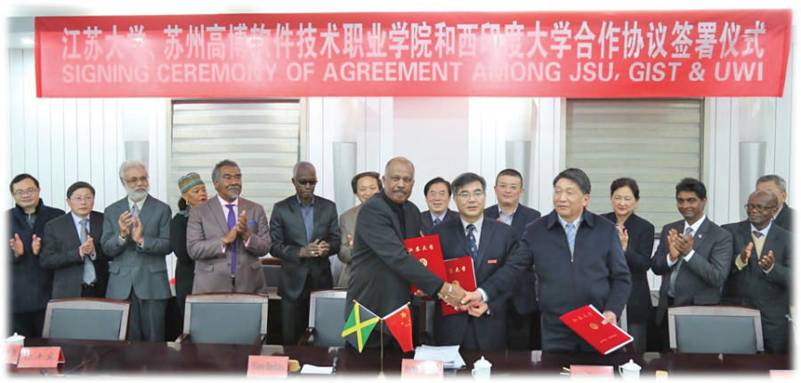 Representatives of The UWI, the Global Institute of Software Technology (GIST) and Jiangsu University at the signing of
the agreement to establish the Jiangsu University Suzhou Caribbean Institute (JUSCI) in China. The JUSCI will be a degree- granting institution for the development of human capacity
in the Caribbean and China, promoting collaboration through the exchange of expertise in pedagogy, training modalities, curriculum design, and management techniques. Its main focus will be in the areas of Science and Technology, allowing Caribbean IT professionals to integrate seamlessly with Chinese companies and professionals for development.