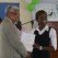 Rachel receiving her Ambassadorial Certificate from Vice Chancellor Harris 